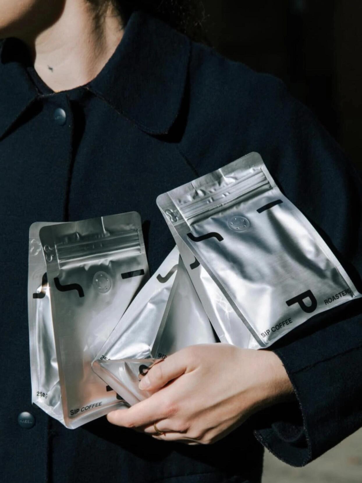 A coffee pouch held in hand